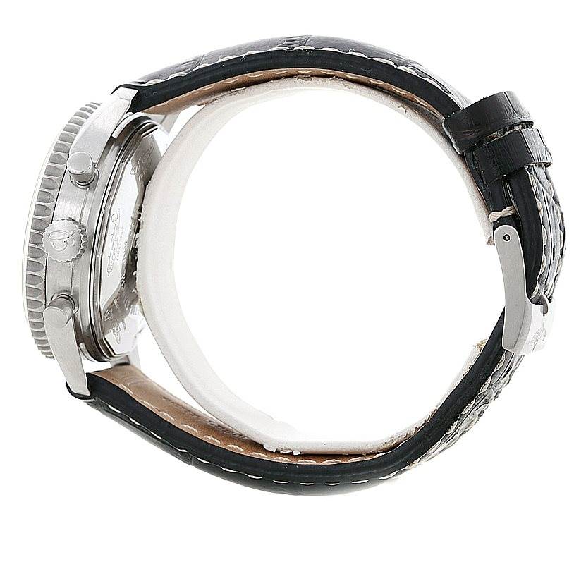 This side view of the Breitling Navitimer A13330 Men's Stainless Steel Silver Dial A13330 Men's Stainless Steel Silver Dial shows the watch's crown, bezel, case, and leather strap.