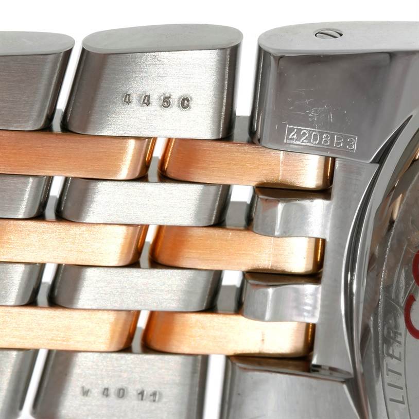 Close-up of the Breitling Navitimer C23340 Men's Steel and Gold (two tone) Silver Dial C23340 Men's Steel and Gold (two tone) Silver Dial watch's two-tone metal bracelet and part of the watch casing.