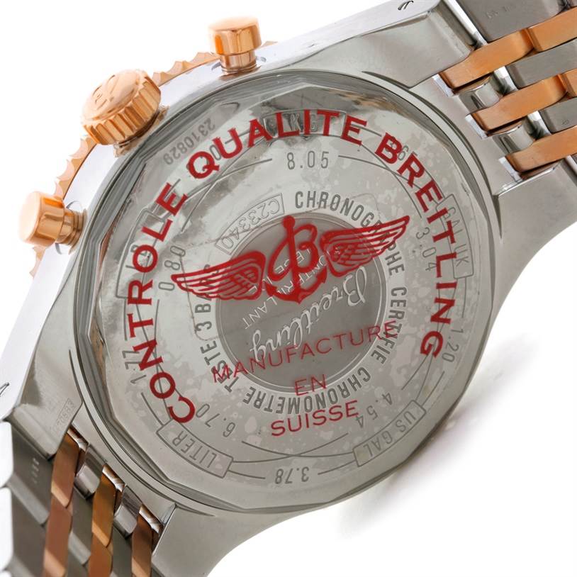 The image shows the back case and part of the metal bracelet of a Breitling Navitimer C23340 Men's Steel and Gold (two tone) Silver Dial C23340 Men's Steel and Gold (two tone) Silver Dial watch at an angled view.