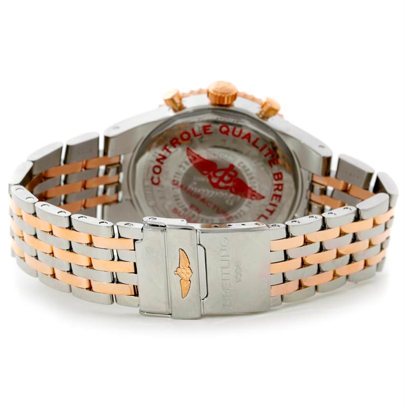The image shows the back view of a Breitling Navitimer C23340 Men's Steel and Gold (two tone) Silver Dial C23340 Men's Steel and Gold (two tone) Silver Dial watch, featuring its stainless steel and rose gold bracelet.