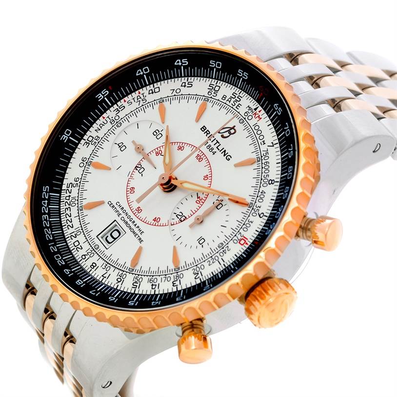 This image shows a close-up of the face and bracelet of a Breitling Navitimer C23340 Men's Steel and Gold (two tone) Silver Dial C23340 Men's Steel and Gold (two tone) Silver Dial watch, highlighting the bezel, crown, and subdials.