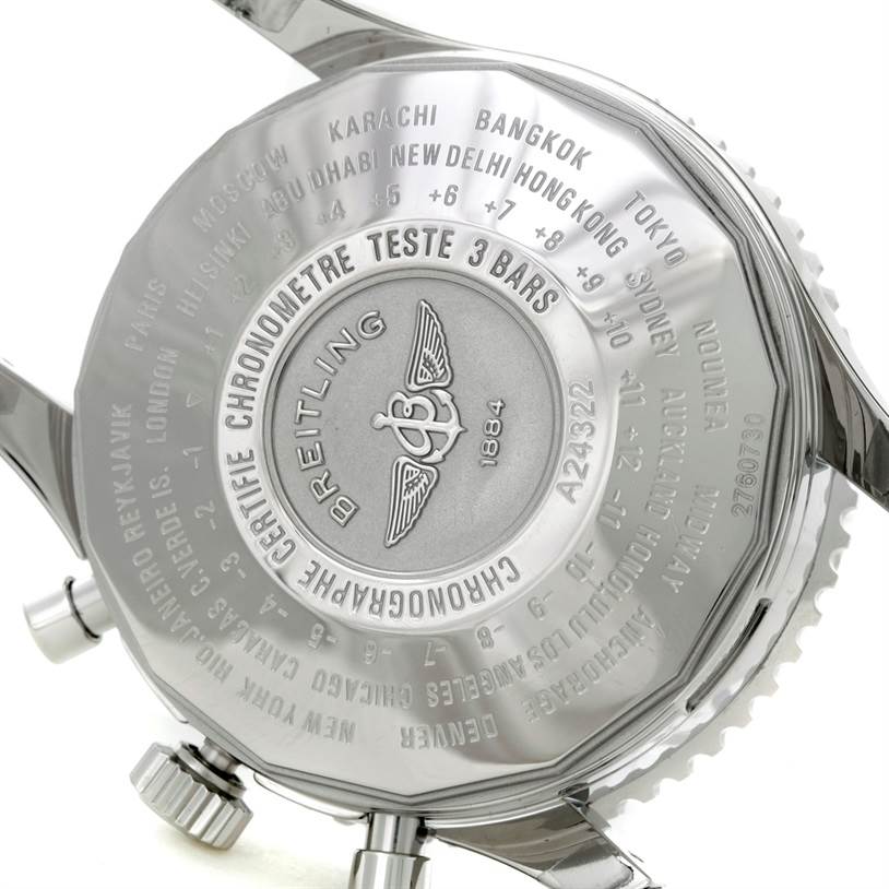 The image shows the back case of a Breitling Navitimer A24322 Men
s Stainless Steel Black Dial A24322 Men
s Stainless Steel Black Dial watch, highlighting its engraved details and time zone markings.
