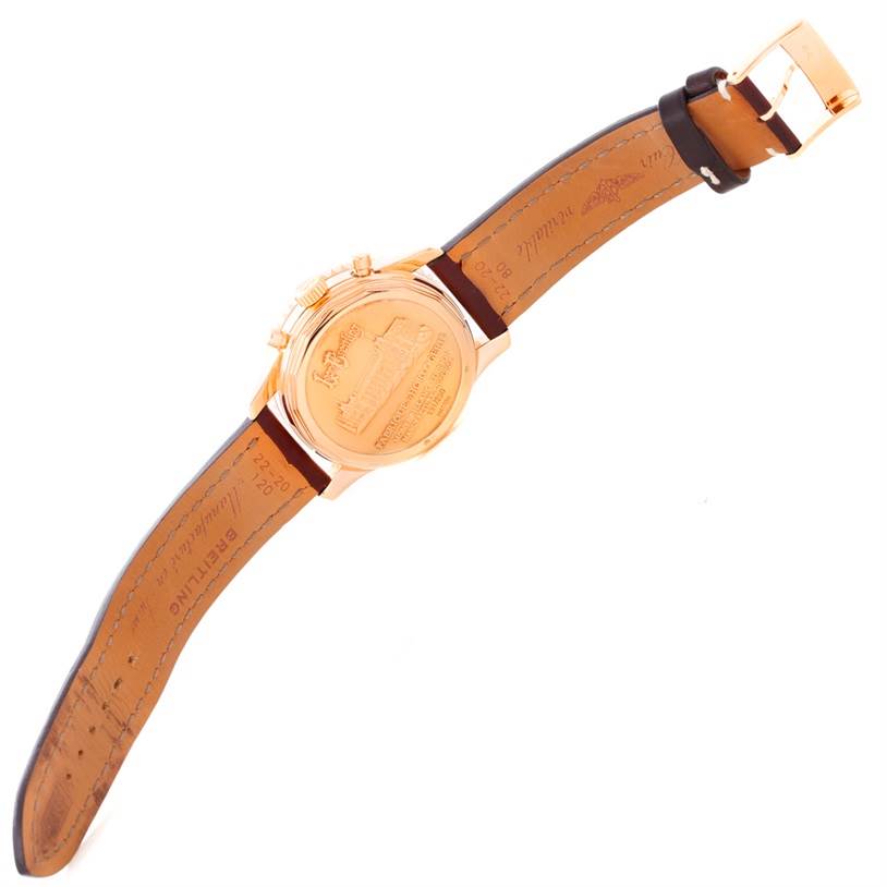 The image shows the back case and leather strap of a Breitling Navitimer H48330 Men's Rose Gold Black Dial H48330 Men's Rose Gold Black Dial watch.