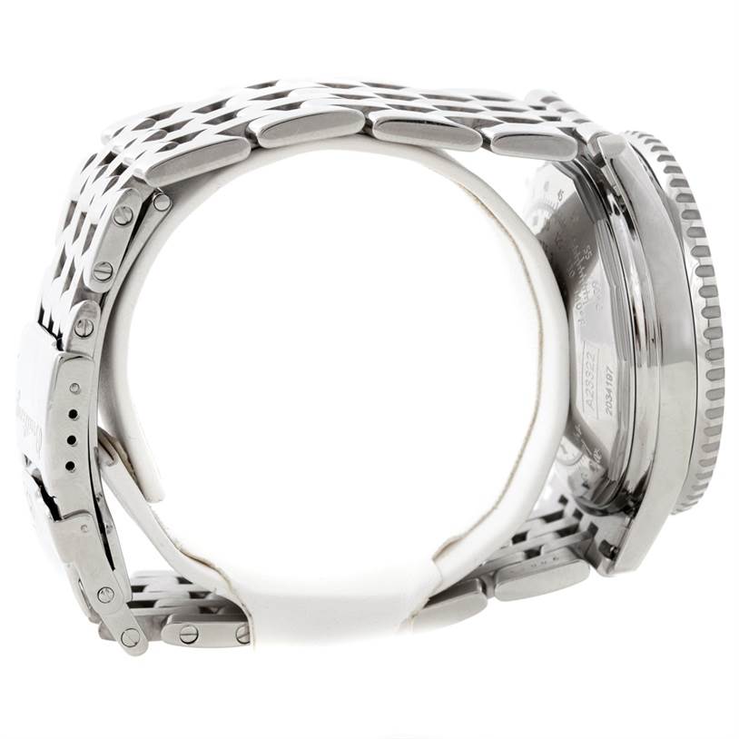 The image shows the side view of a Breitling Navitimer A23322 Men's Stainless Steel Silver Dial A23322 Men's Stainless Steel Silver Dial watch, focusing on the metal band and partially on the watch case.