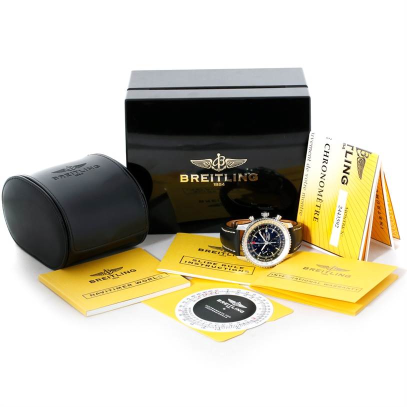 The image shows a Breitling Navitimer A24322 Men
s Stainless Steel Black Dial A24322 Men
s Stainless Steel Black Dial watch along with its box, manuals, and a slide rule.