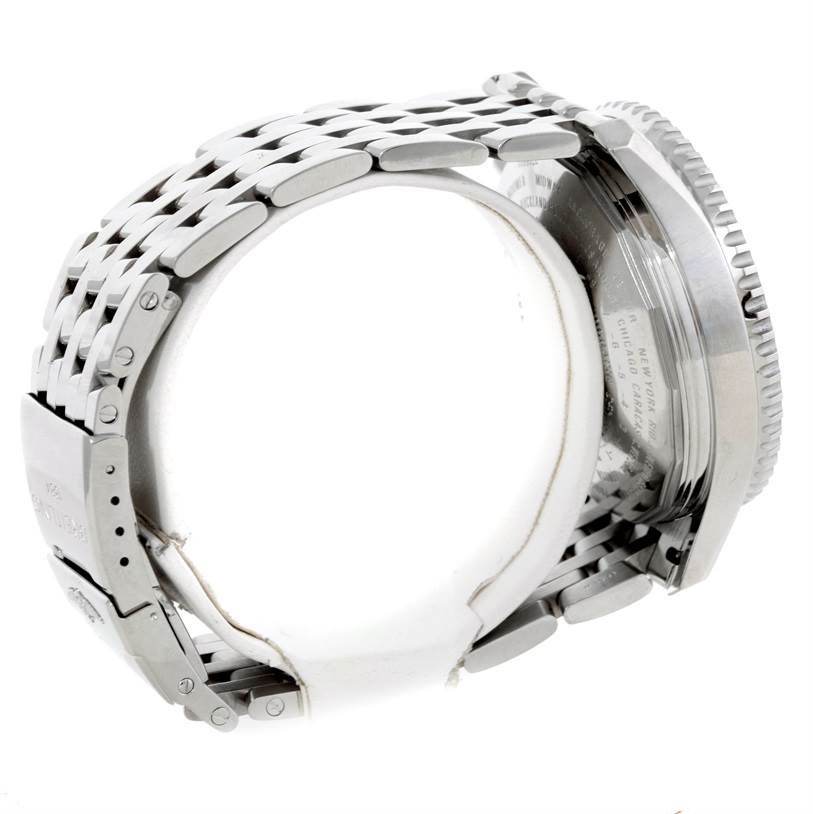 The image shows a side view of a Breitling Navitimer A24322 Men's Stainless Steel White Dial A24322 Men's Stainless Steel White Dial watch, highlighting the metal bracelet and clasp, as well as the case back.