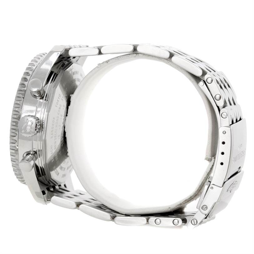The image shows the side and part of the back of a Breitling Navitimer A24322 Men's Stainless Steel White Dial A24322 Men's Stainless Steel White Dial watch with its metal bracelet and clasp visible.
