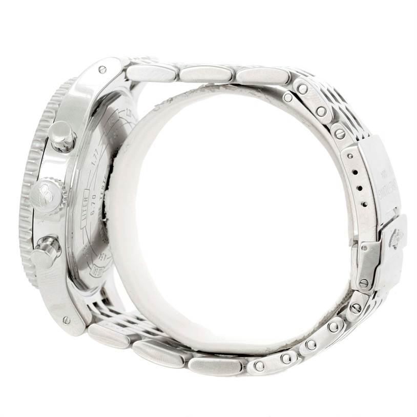 Side view of a Breitling Navitimer A23340 Men's Stainless Steel Brown Dial A23340 Men's Stainless Steel Brown Dial watch showing the case, crown, pushers, bezel, and metal bracelet.