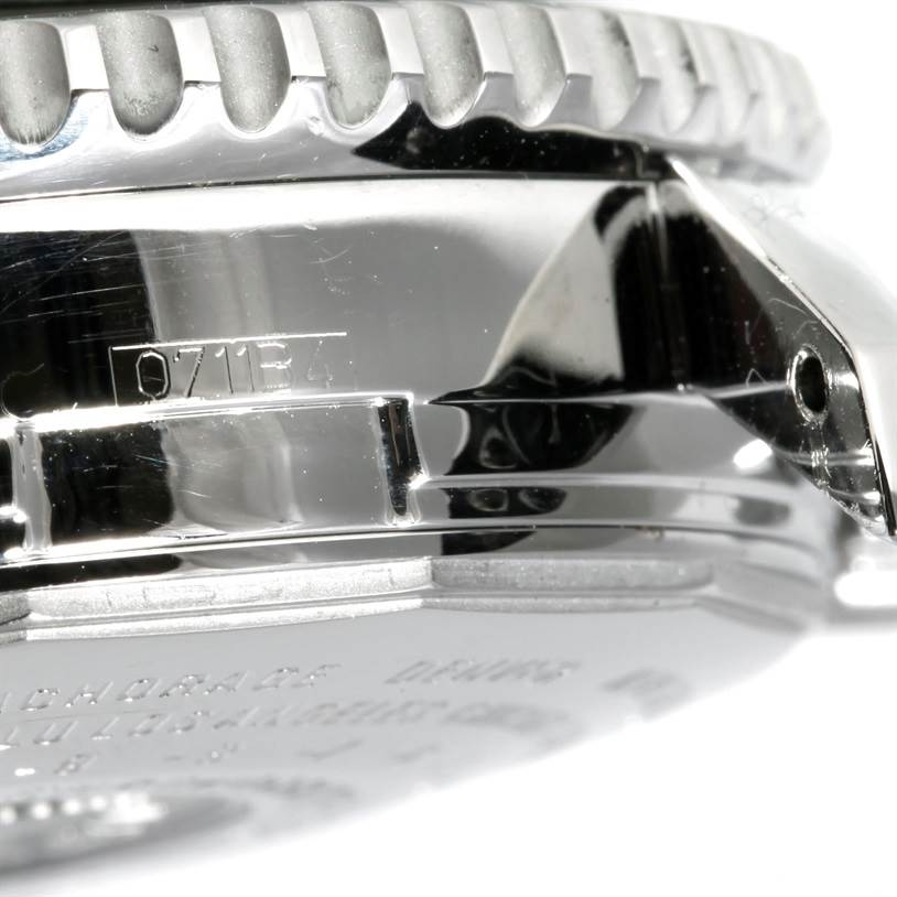 The image shows a close-up side angle of a Breitling Navitimer A24322 Men's Stainless Steel Black Dial A24322 Men's Stainless Steel Black Dial watch, featuring the bezel, case, and part of the crown guard.