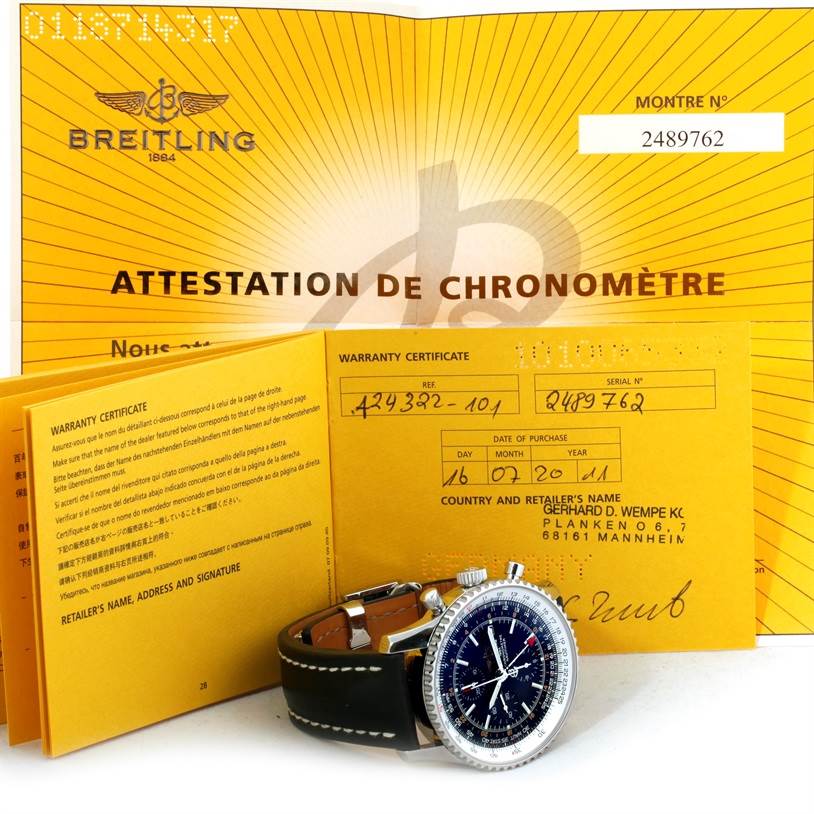 The image shows a Breitling Navitimer A24322 Men's Stainless Steel Black Dial A24322 Men's Stainless Steel Black Dial watch at a slight side angle with accompanying warranty and certification documents.