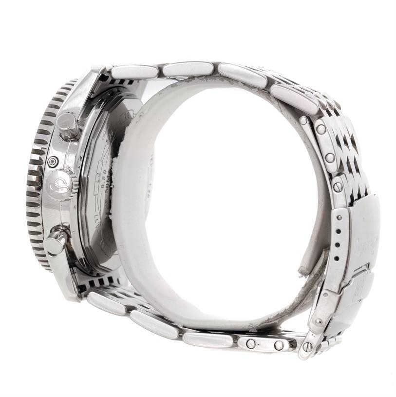 This image shows a side view of the Breitling Navitimer A19340 Men's Stainless Steel Black Dial A19340 Men's Stainless Steel Black Dial watch, highlighting the case, crown, pushers, and stainless steel bracelet.