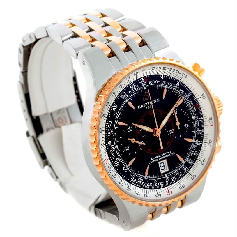 The Breitling Navitimer C23340 Men
s Steel and Gold (two tone) Black Dial C23340 Men
s Steel and Gold (two tone) Black Dial watch is shown at an angled view, displaying its dial, bezel, and two-tone bracelet.