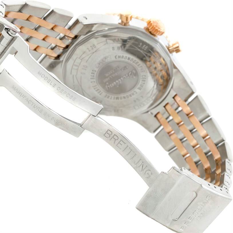 The image shows the back and clasp of a Breitling Navitimer C23340 Men
s Steel and Gold (two tone) Black Dial C23340 Men
s Steel and Gold (two tone) Black Dial watch, highlighting the bracelet and engraved branding.