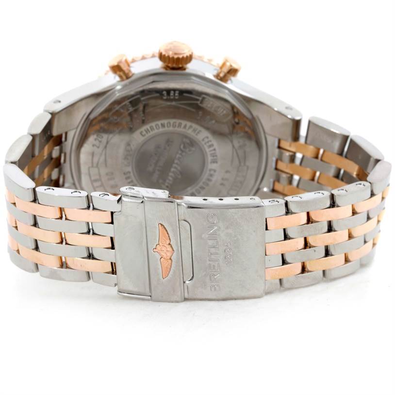 This image shows the back case and clasp of a Breitling Navitimer C23340 Men
s Steel and Gold (two tone) Black Dial C23340 Men
s Steel and Gold (two tone) Black Dial watch, highlighting the two-tone metal bracelet. 