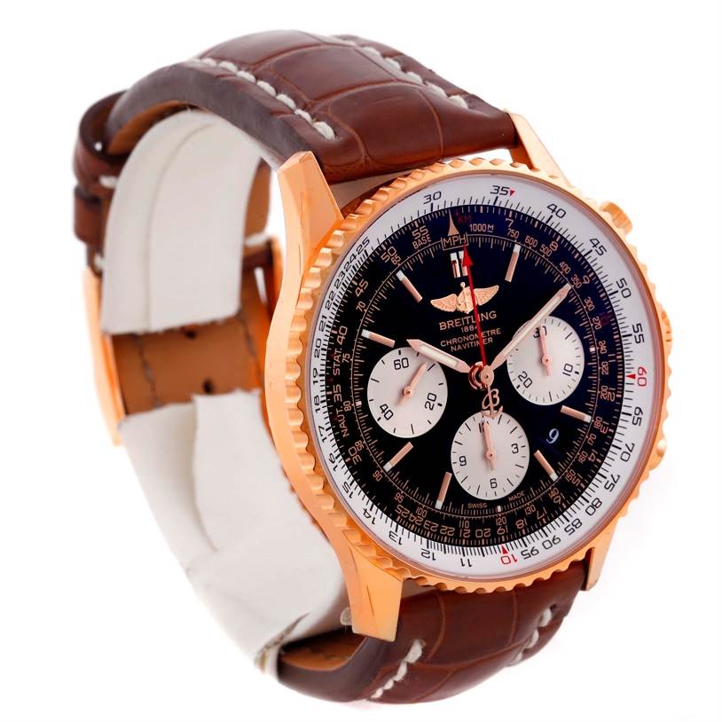 The Breitling Navitimer RB0120 Men's Rose Gold Black Dial RB0120 Men's Rose Gold Black Dial is shown in a three-quarter view, displaying its face, bezel, and brown leather strap.