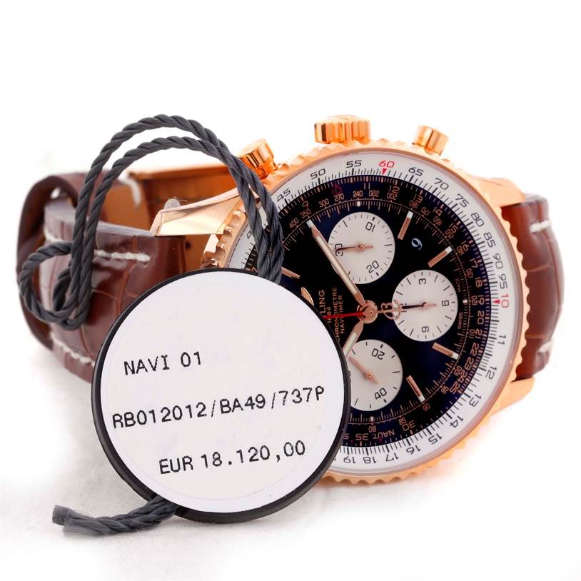 The Breitling Navitimer RB0120 Men's Rose Gold Black Dial RB0120 Men's Rose Gold Black Dial watch image shows a close-up angle focusing on the dial, bezel, pushers, crown, and part of the strap.