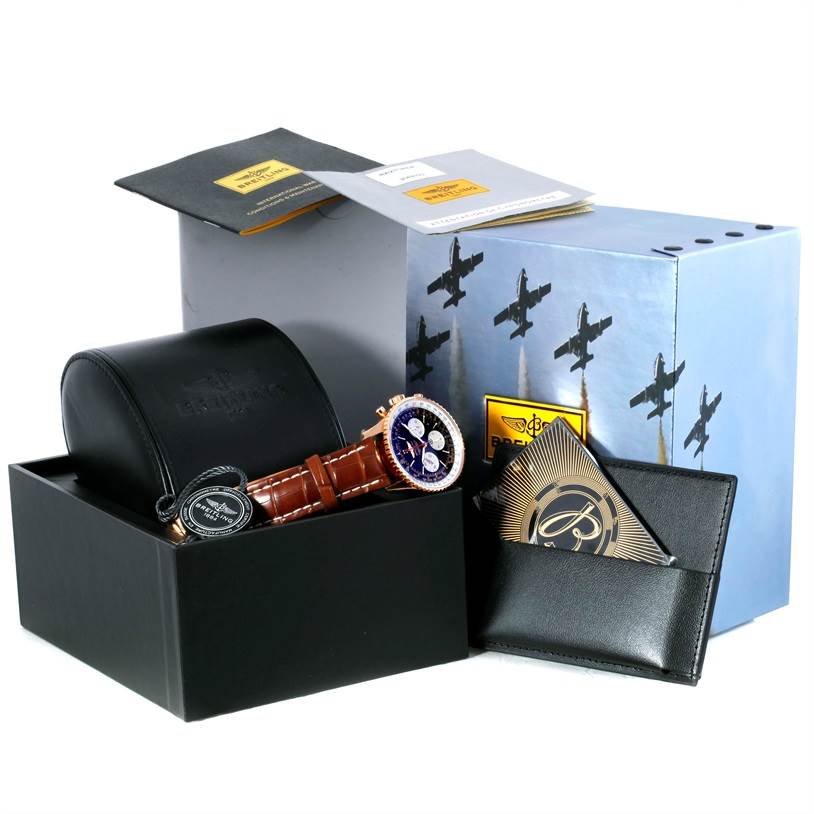 The image shows a Breitling Navitimer RB0120 Men's Rose Gold Black Dial RB0120 Men's Rose Gold Black Dial watch with a brown leather strap, displayed in a box with accessories and packaging.