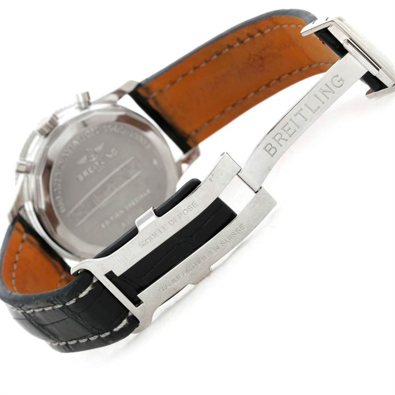 The image shows the backside and buckle of a Breitling Navitimer A35330 Men's Stainless Steel Black Dial A35330 Men's Stainless Steel Black Dial watch at an angle highlighting its clasp and back case.