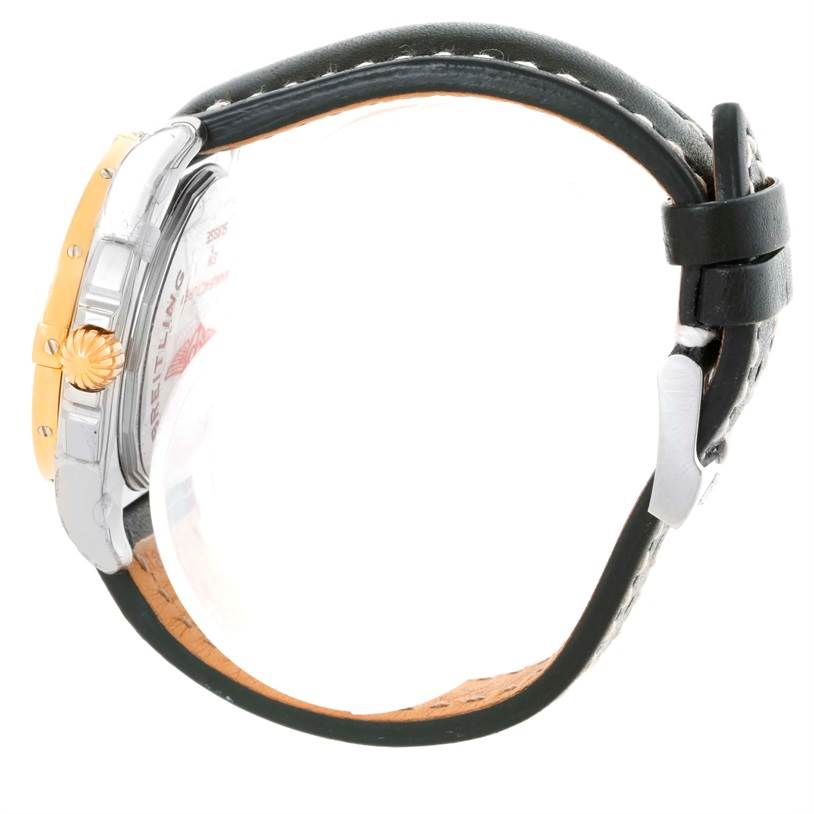 The image shows the side view of a Breitling Galactic C37330 Men's Steel and Gold (two tone) Black Dial C37330 Men's Steel and Gold (two tone) Black Dial model watch, highlighting its crown, bezel, and leather strap.