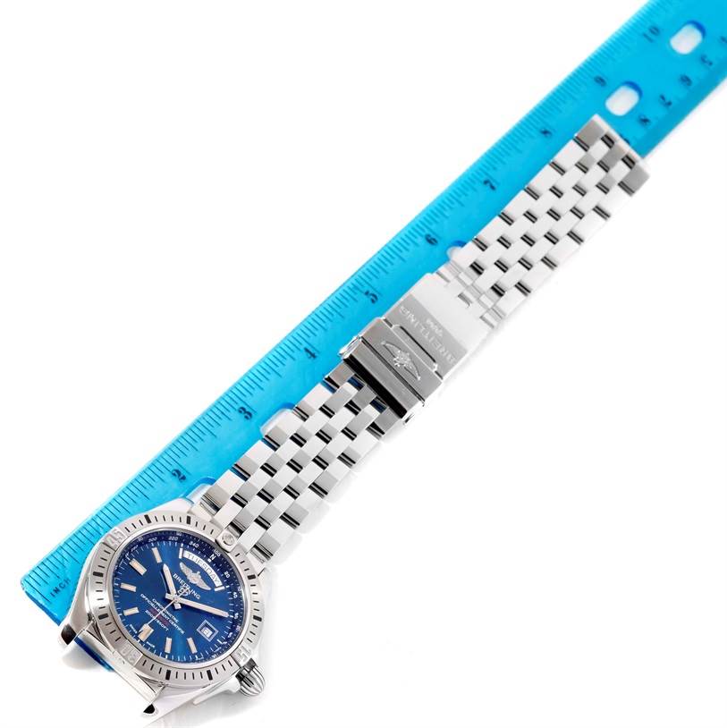 The image shows a Breitling Galactic A45320 Men's Stainless Steel Blue Dial A45320 Men's Stainless Steel Blue Dial watch with a blue dial and stainless steel bracelet, positioned next to a ruler for measurement.