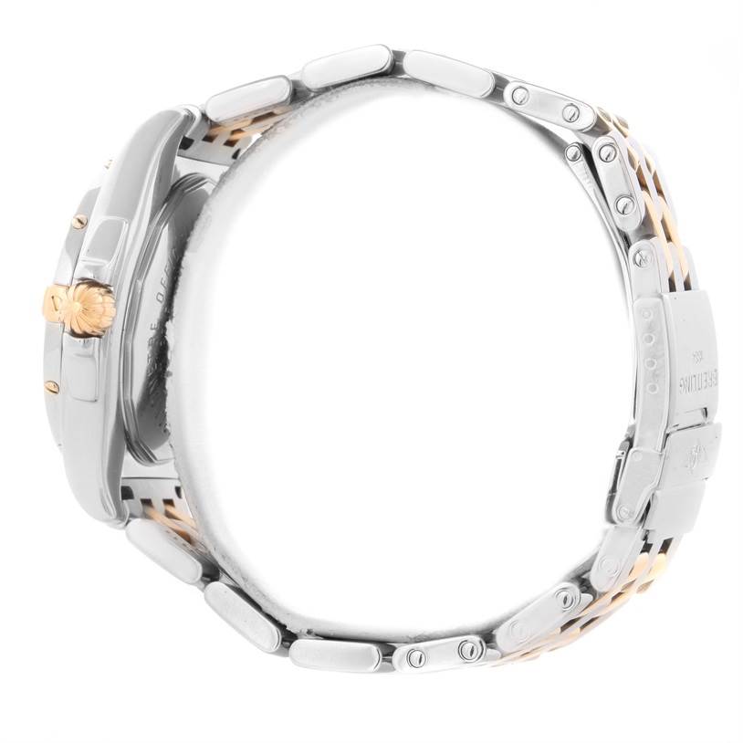 This side view of the Breitling Windrider B49350 Men's Stainless Steel Blue Dial B49350 Men's Stainless Steel Blue Dial watch shows the crown, case, and metal bracelet with gold accents.