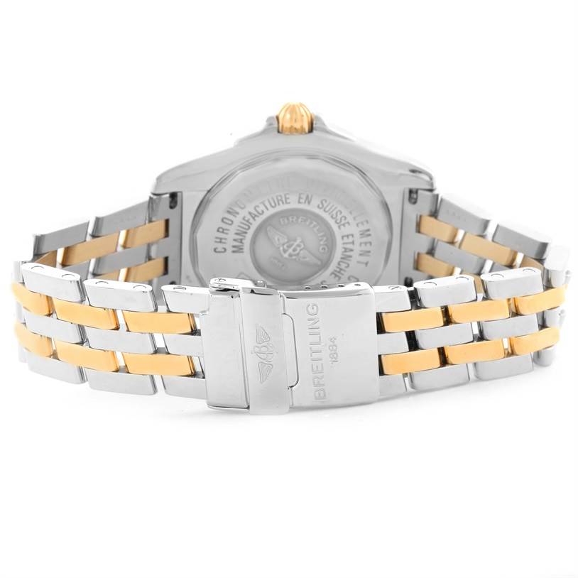 This image shows the back and clasp of the Breitling Windrider B49350 Men's Stainless Steel Blue Dial B49350 Men's Stainless Steel Blue Dial model watch with its stainless steel and gold bracelet.