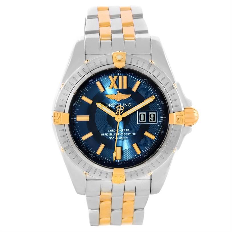 The image shows a Breitling Windrider B49350 Men's Stainless Steel Blue Dial B49350 Men's Stainless Steel Blue Dial watch from a front view, highlighting its blue dial, gold accents, and metallic strap.