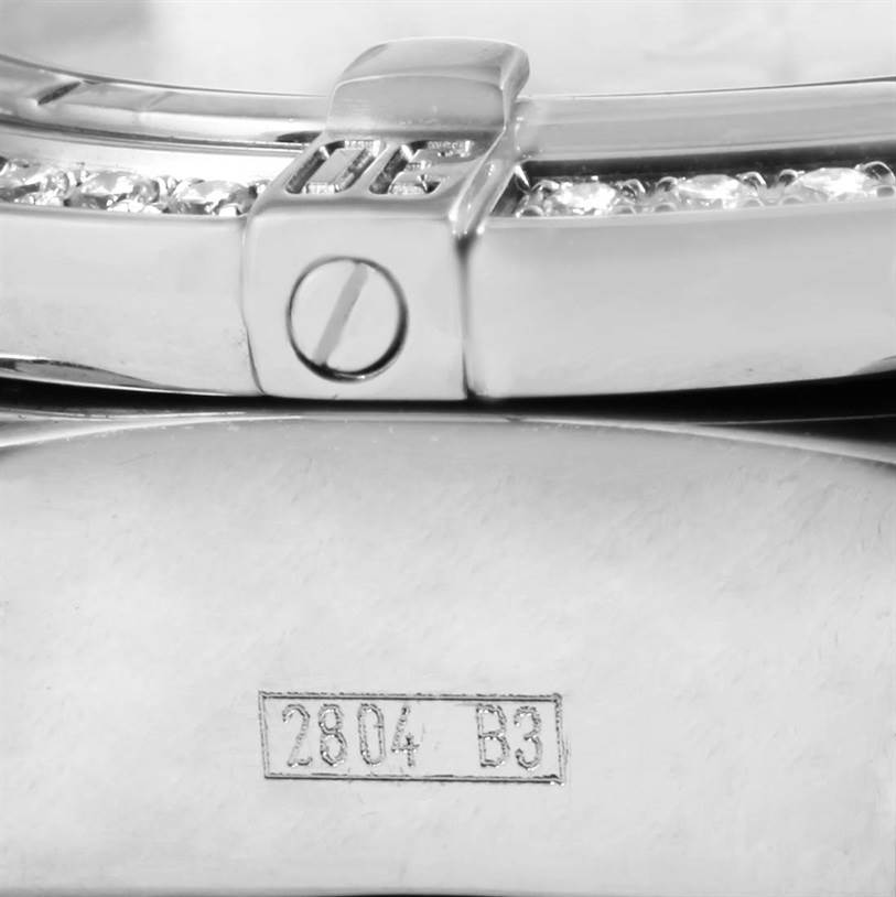 The image shows a close-up of the bracelet clasp and serial number engraving of a Breitling Windrider A13357 Stainless Steel Mother of Pearl Dial A13357 Stainless Steel Mother of Pearl Dial watch.