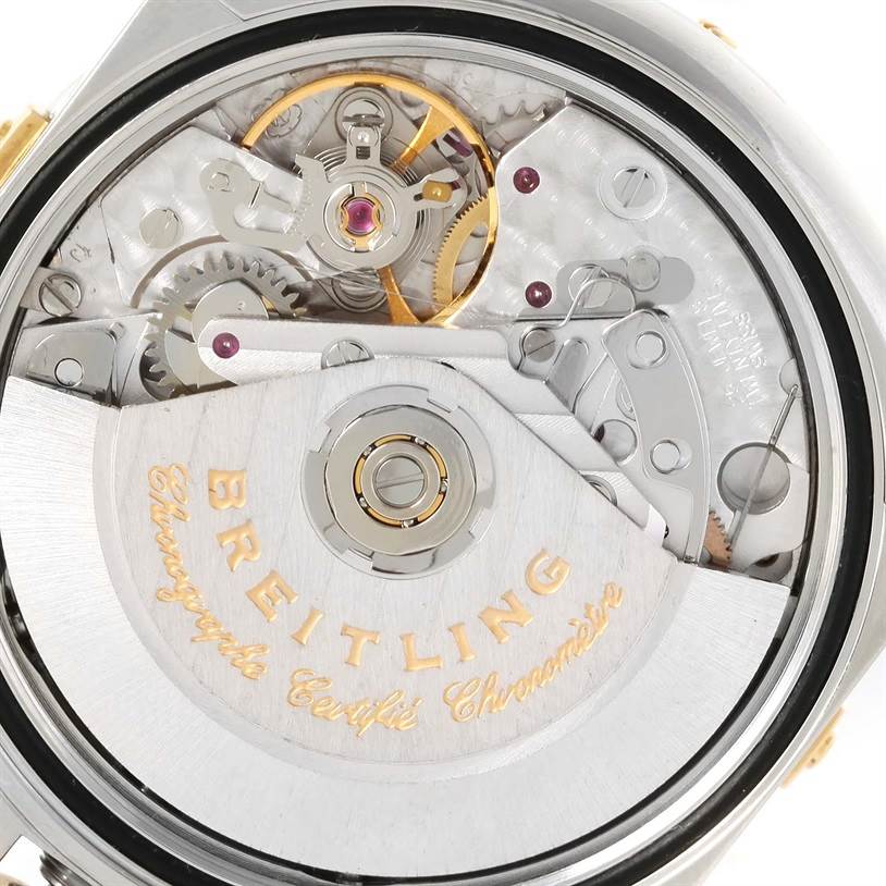 The image shows the inner mechanism, rotor, and intricate gears of a Breitling Windrider B13358 Steel and Gold (two tone) Blue Dial B13358 Steel and Gold (two tone) Blue Dial watch from the back view.