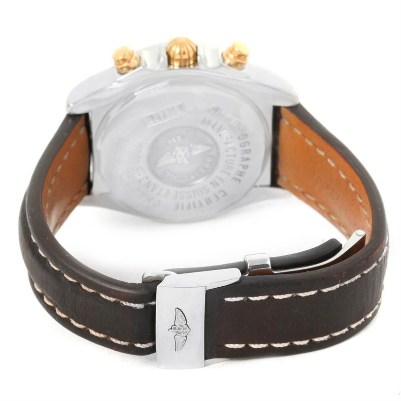 The image shows the back view of the Breitling Windrider B13358 Steel and Gold (two tone) Blue Dial B13358 Steel and Gold (two tone) Blue Dial watch, highlighting the case back and the leather strap with buckle.