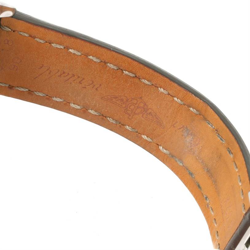 The image shows the inner side of a leather strap from a Breitling Windrider B13358 Steel and Gold (two tone) Blue Dial B13358 Steel and Gold (two tone) Blue Dial watch, highlighting the stitching and branding.