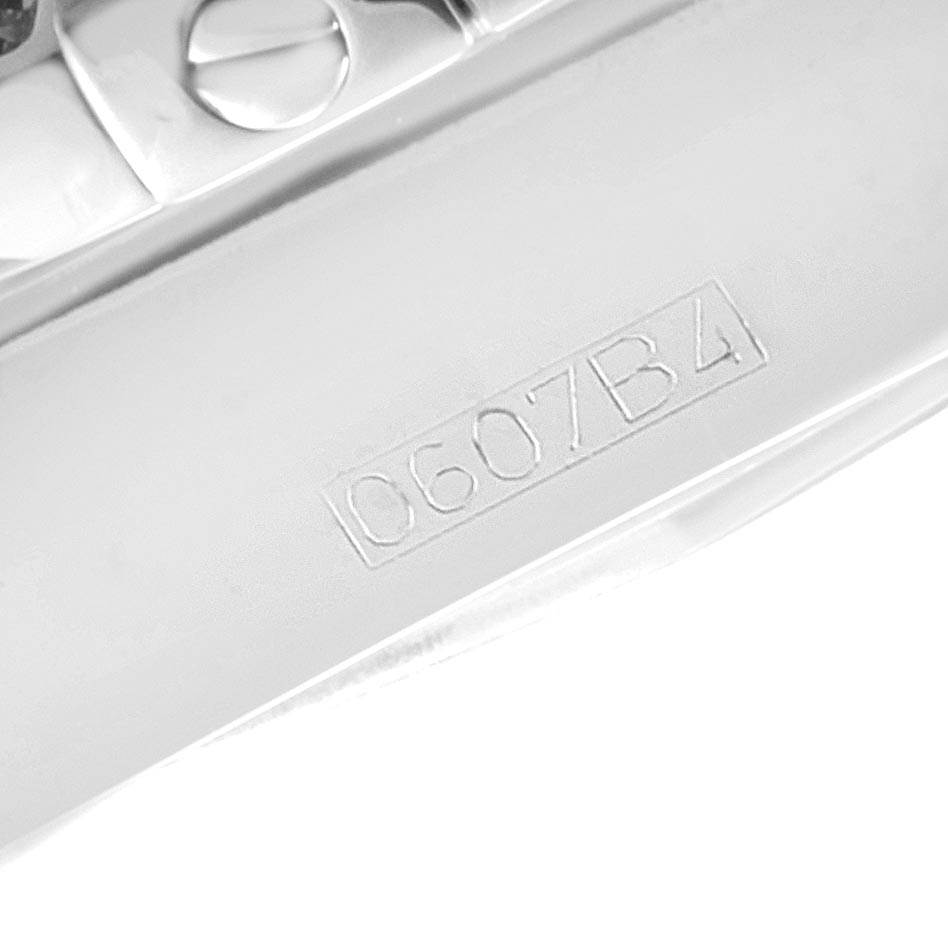 The image shows a close-up view of a part of a Breitling Windrider A49350LA/A702-366A Men's Stainless Steel Mother of Pearl Dial A49350LA/A702-366A Men's Stainless Steel Mother of Pearl Dial watch, displaying a serial number.