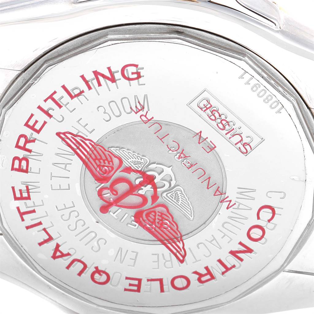 The image shows the case back of a Breitling Windrider C49350 Men's Steel and Gold (two tone) Champagne Dial C49350 Men's Steel and Gold (two tone) Champagne Dial watch, featuring branding and certification details.