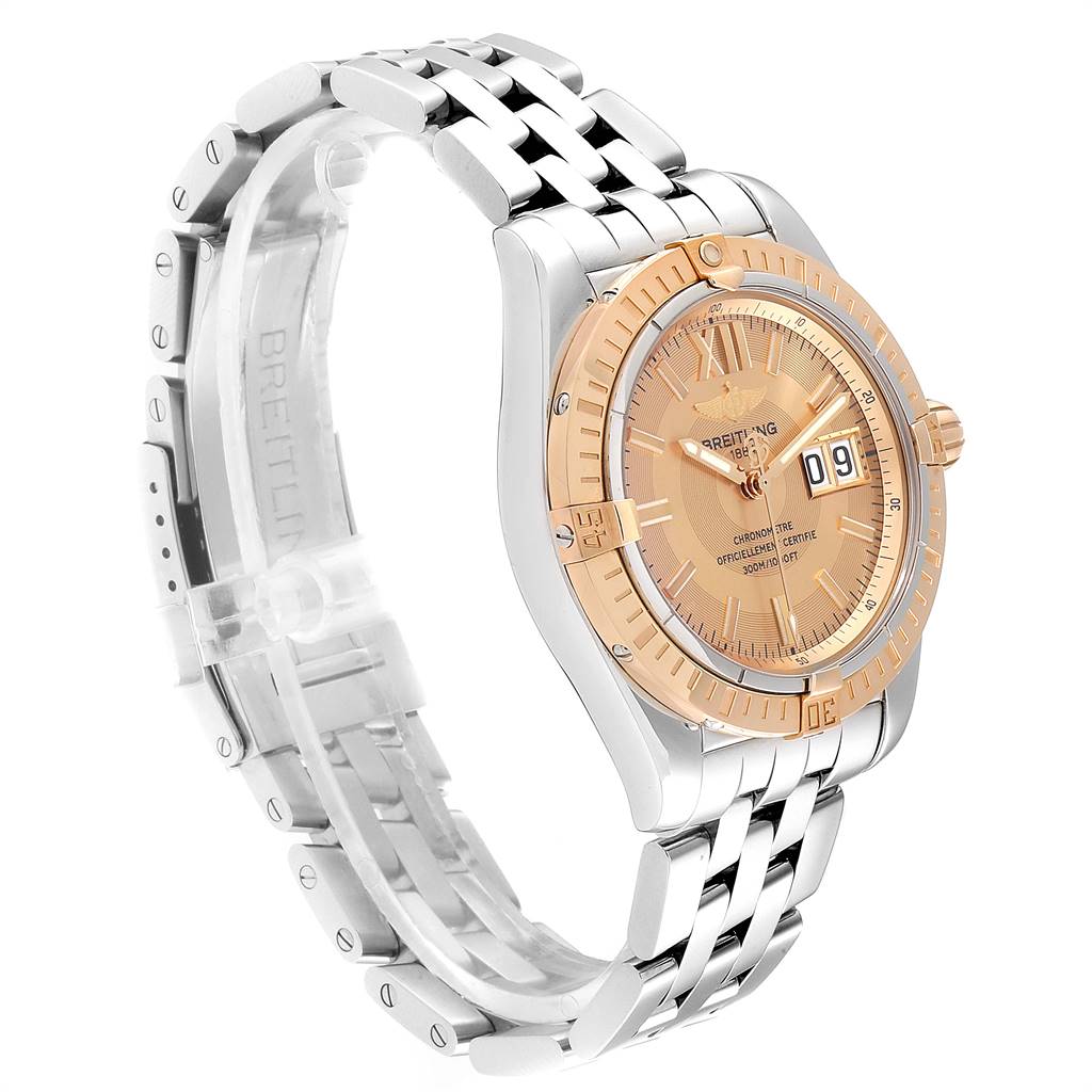 The Breitling Windrider C49350 Men's Steel and Gold (two tone) Champagne Dial C49350 Men's Steel and Gold (two tone) Champagne Dial watch is shown at a three-quarter angle, revealing the face, bezel, and part of the bracelet.