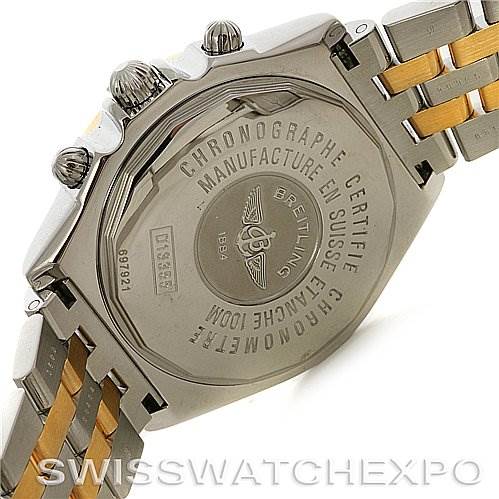 The image shows the case back and part of the bracelet of a Breitling Windrider D1335512 Men's Steel and Gold (two tone) Grey Dial D1335512 Men's Steel and Gold (two tone) Grey Dial model watch.