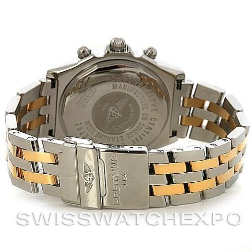 The image shows the back and clasp of a Breitling Windrider D1335512 Men's Steel and Gold (two tone) Grey Dial D1335512 Men's Steel and Gold (two tone) Grey Dial watch, displaying the bracelet and engraved details on the case back.