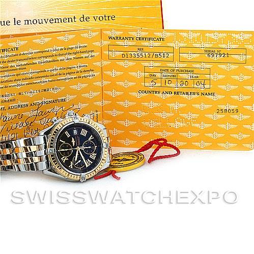 The image shows a Breitling Windrider D1335512 Men's Steel and Gold (two tone) Grey Dial D1335512 Men's Steel and Gold (two tone) Grey Dial watch with its bracelet, warranty certificate, and associated paperwork from SWISSWATCHEXPO.