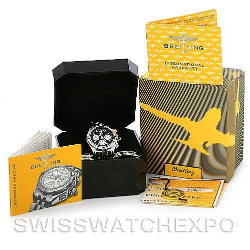 The image shows a Breitling Windrider A4435512 Men's Stainless Steel Black Dial A4435512 Men's Stainless Steel Black Dial watch in its open box, along with manuals, warranty cards, and packaging.