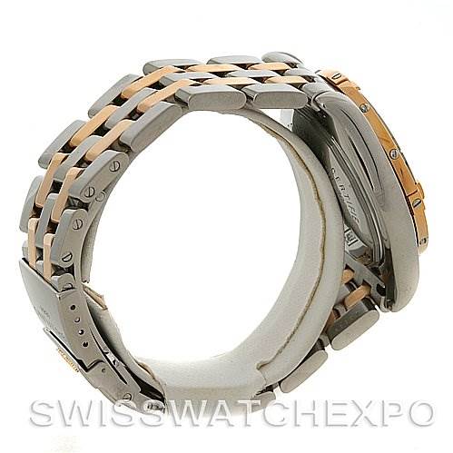 The image shows a side view of a Breitling Windrider C49350 Men's Steel and Gold (two tone) Black Dial C49350 Men's Steel and Gold (two tone) Black Dial watch with its two-tone metal bracelet and partially visible case.