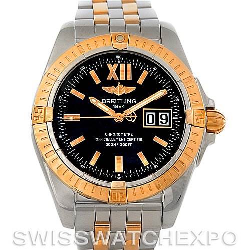 This image displays a front view of the Breitling Windrider C49350 Men's Steel and Gold (two tone) Black Dial C49350 Men's Steel and Gold (two tone) Black Dial watch, showcasing its black dial, gold bezel, date window, and two-tone bracelet.