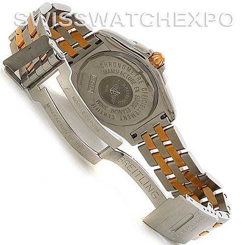 The image shows the back view of the Breitling Windrider C49350 Men's Steel and Gold (two tone) Black Dial C49350 Men's Steel and Gold (two tone) Black Dial watch, highlighting the case back and stainless steel and gold bracelet.