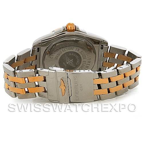 This image shows the back view of a Breitling Windrider C49350 Men's Steel and Gold (two tone) Black Dial C49350 Men's Steel and Gold (two tone) Black Dial watch, highlighting the case back, crown, and two-tone metal bracelet.