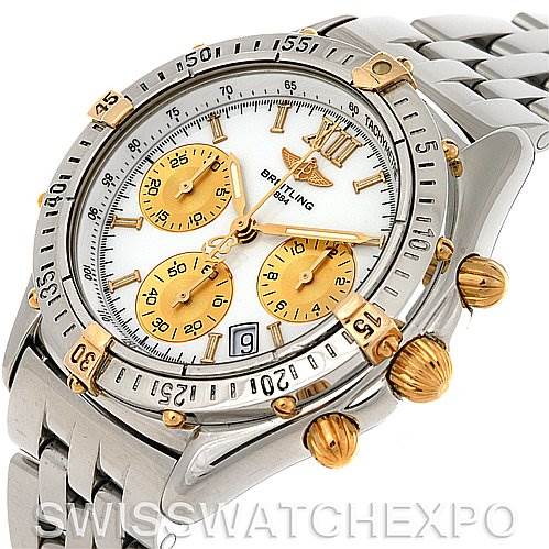 This image shows a Breitling Windrider B55048 Men's Steel and Gold (two tone) White Dial B55048 Men's Steel and Gold (two tone) White Dial model watch at an angled view, displaying the bezel, dial, sub-dials, and part of the bracelet.