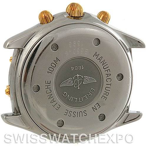 The image shows the back case of a Breitling Windrider B55048 Men's Steel and Gold (two tone) White Dial B55048 Men's Steel and Gold (two tone) White Dial watch, including the crown and pushers.