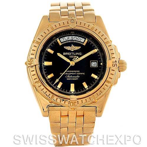 The image displays a Breitling Windrider Men's Yellow Gold Black Dial Men's Yellow Gold Black Dial watch from a front angle, showcasing its face, bezel, and bracelet.