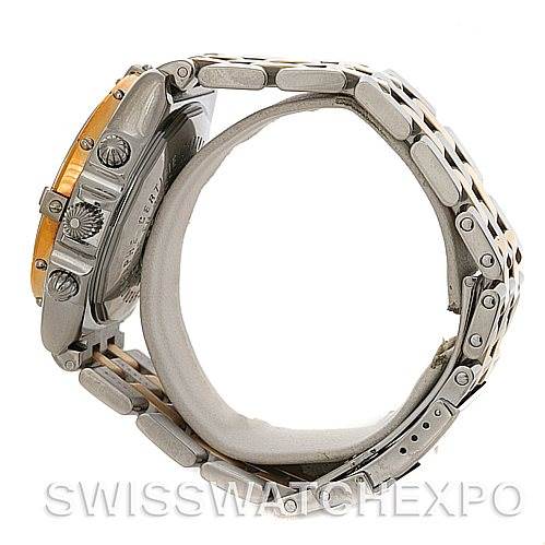 This image shows a side view of the Breitling Windrider D1335512 Men's Steel and Gold (two tone) Black Dial D1335512 Men's Steel and Gold (two tone) Black Dial model, highlighting the watch's crown, pushers, and bracelet.