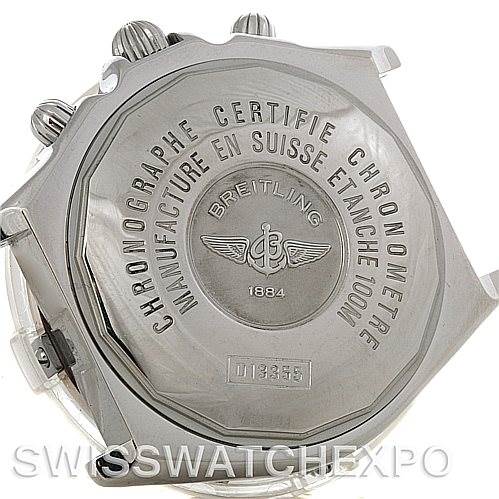 The image shows the back case of a Breitling Windrider D1335512 Men's Steel and Gold (two tone) Black Dial D1335512 Men's Steel and Gold (two tone) Black Dial watch with engraved details and visible pushers on the side.