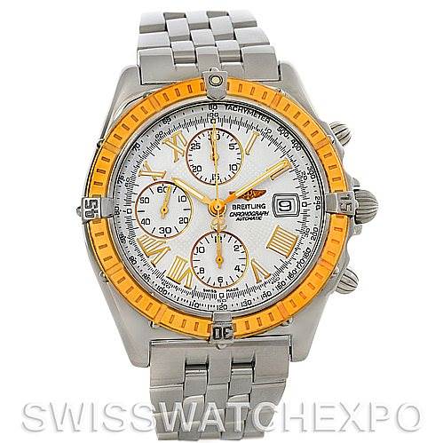 The image shows a Breitling Windrider D13055 Men's Stainless Steel White Dial D13055 Men's Stainless Steel White Dial watch from a front angle, highlighting its silver bracelet, orange bezel, and chronograph features.