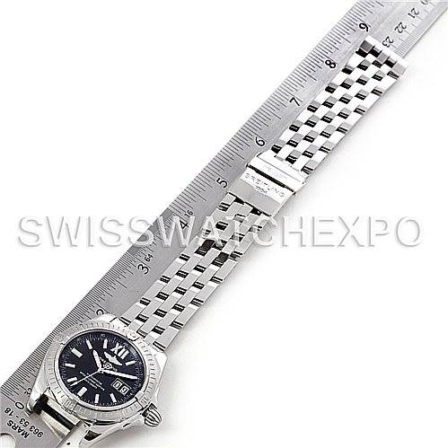 The image shows a Breitling Windrider A49350 Men's Stainless Steel Black Dial A49350 Men's Stainless Steel Black Dial watch laid flat next to a ruler, displaying its face and metal bracelet.