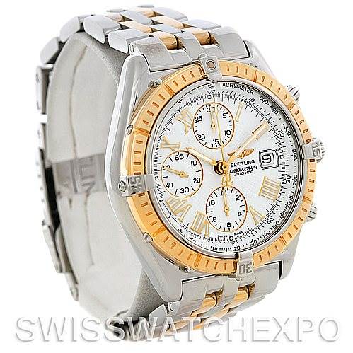 The image shows a side and front angle of the Breitling Windrider D13055 Men
s Stainless Steel White Dial D13055 Men
s Stainless Steel White Dial watch, highlighting its gold and silver detailing and chronograph features.